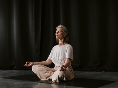 Detail of hands in a meditative yoga mudra position